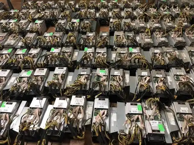 A state-of-the-art mining farm with rows of mining rigs