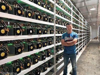 A mining farm using advanced immersion cooling technology to keep its equipment running optimally.
